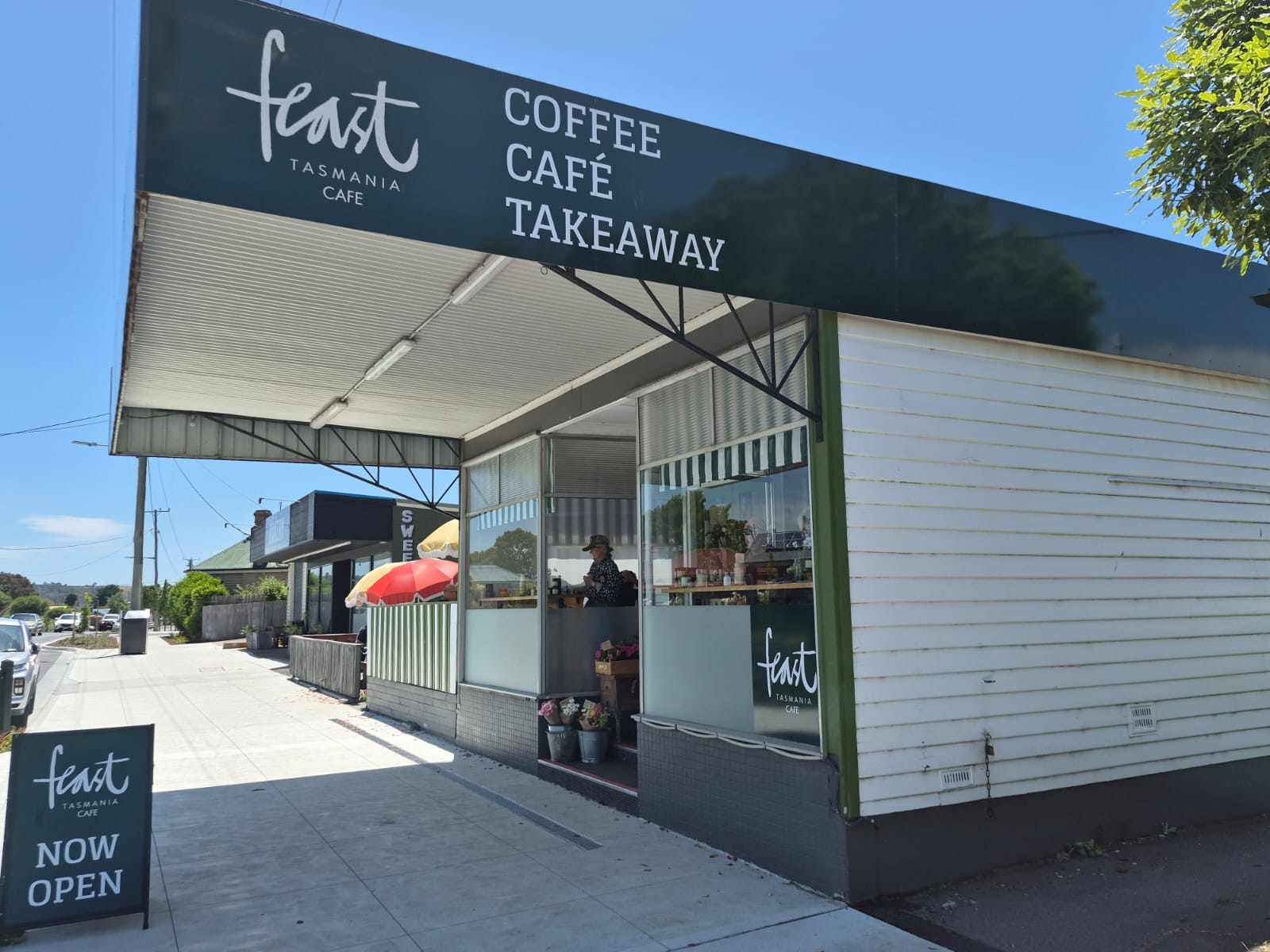 Feast Tasmania from the footpath, the green awning reading Coffee, Cafe, Takeaway